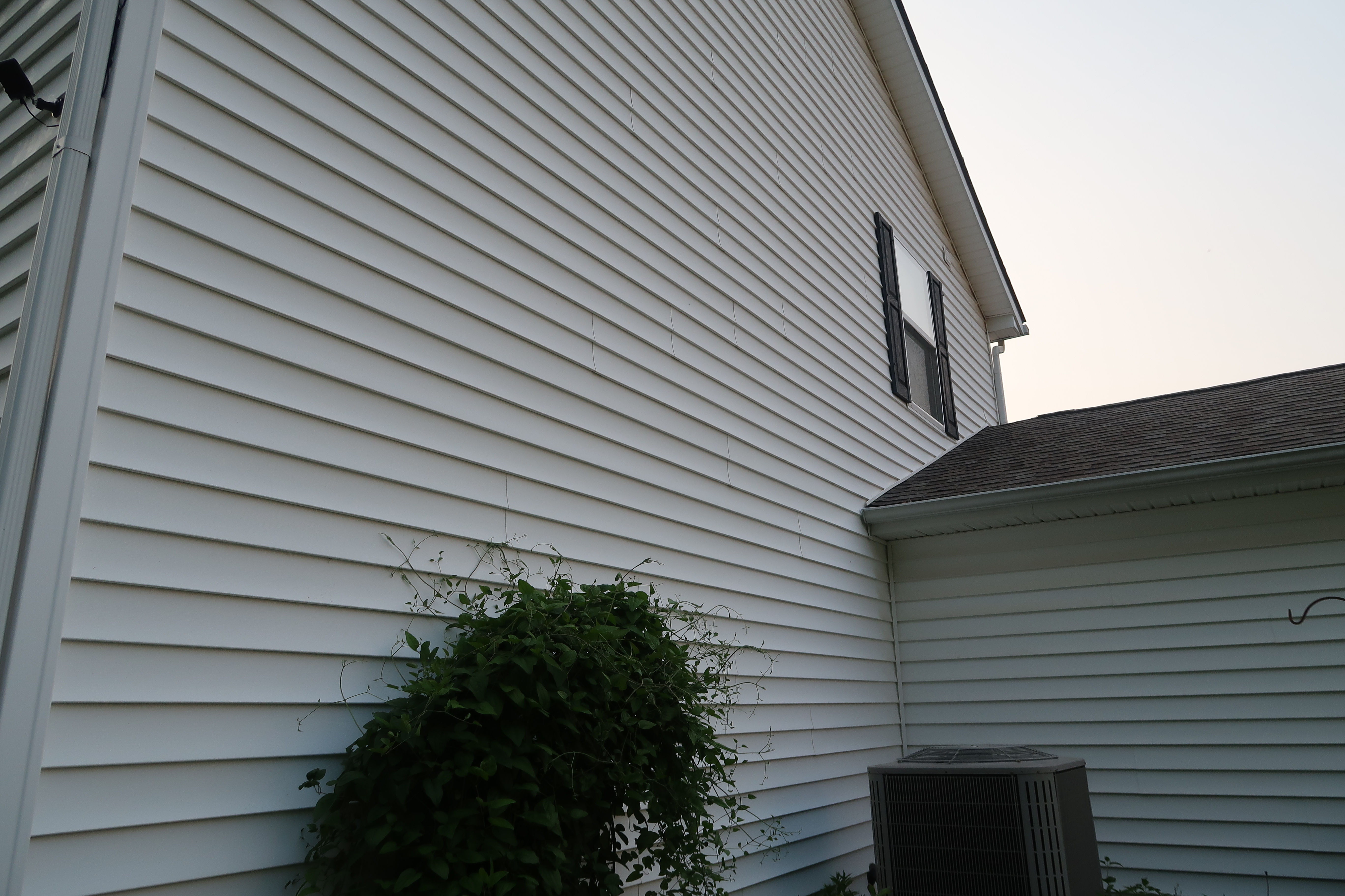 Clean house siding after soft washing