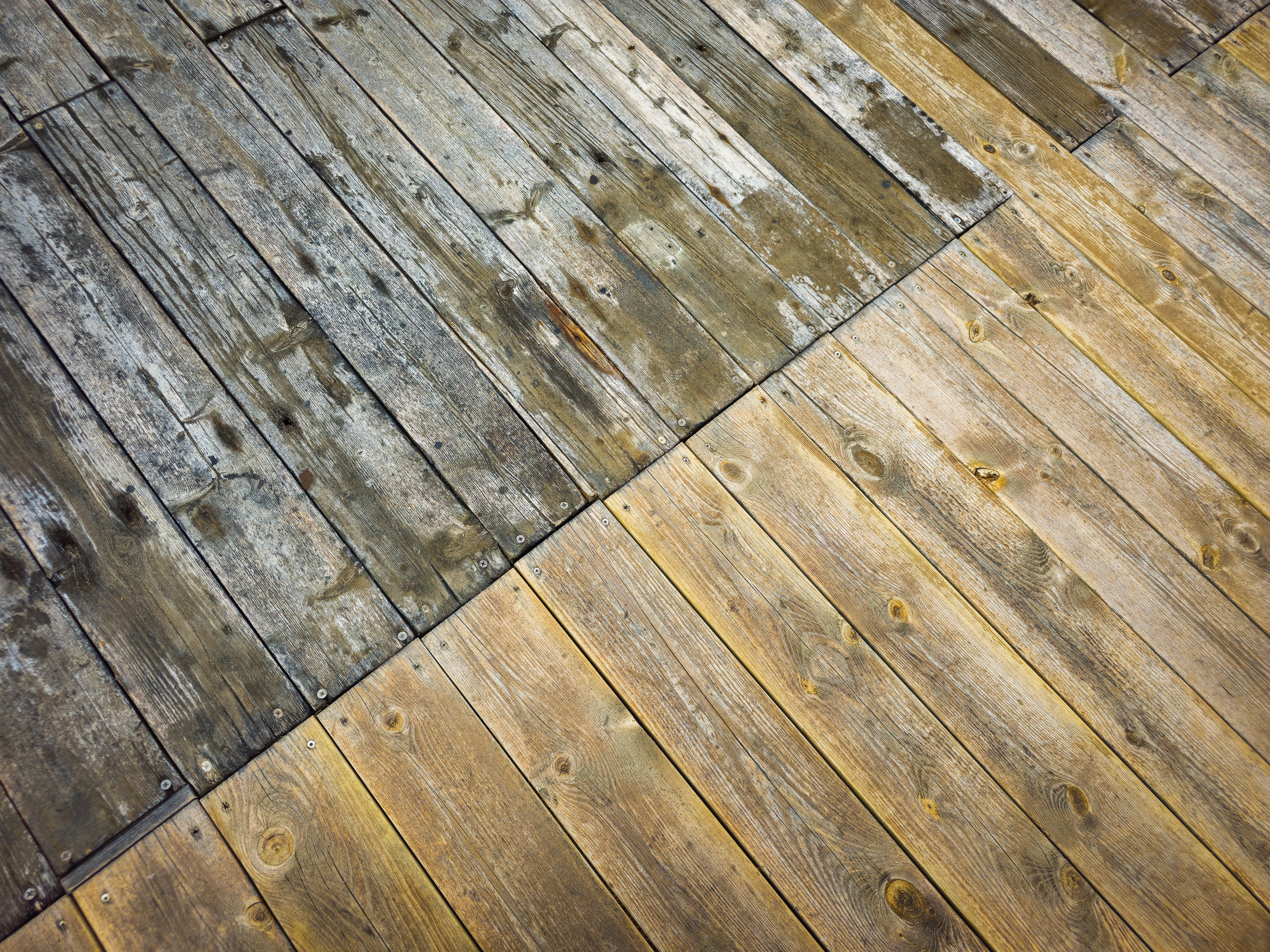 Weathered deck boards before cleaning